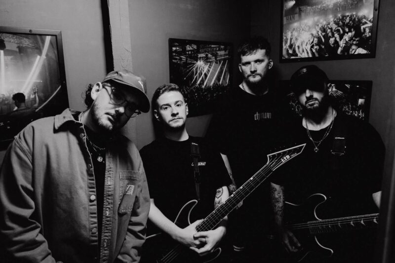 Black and white moody shot of Continents backstage in Liverpool, moments before going on stage.